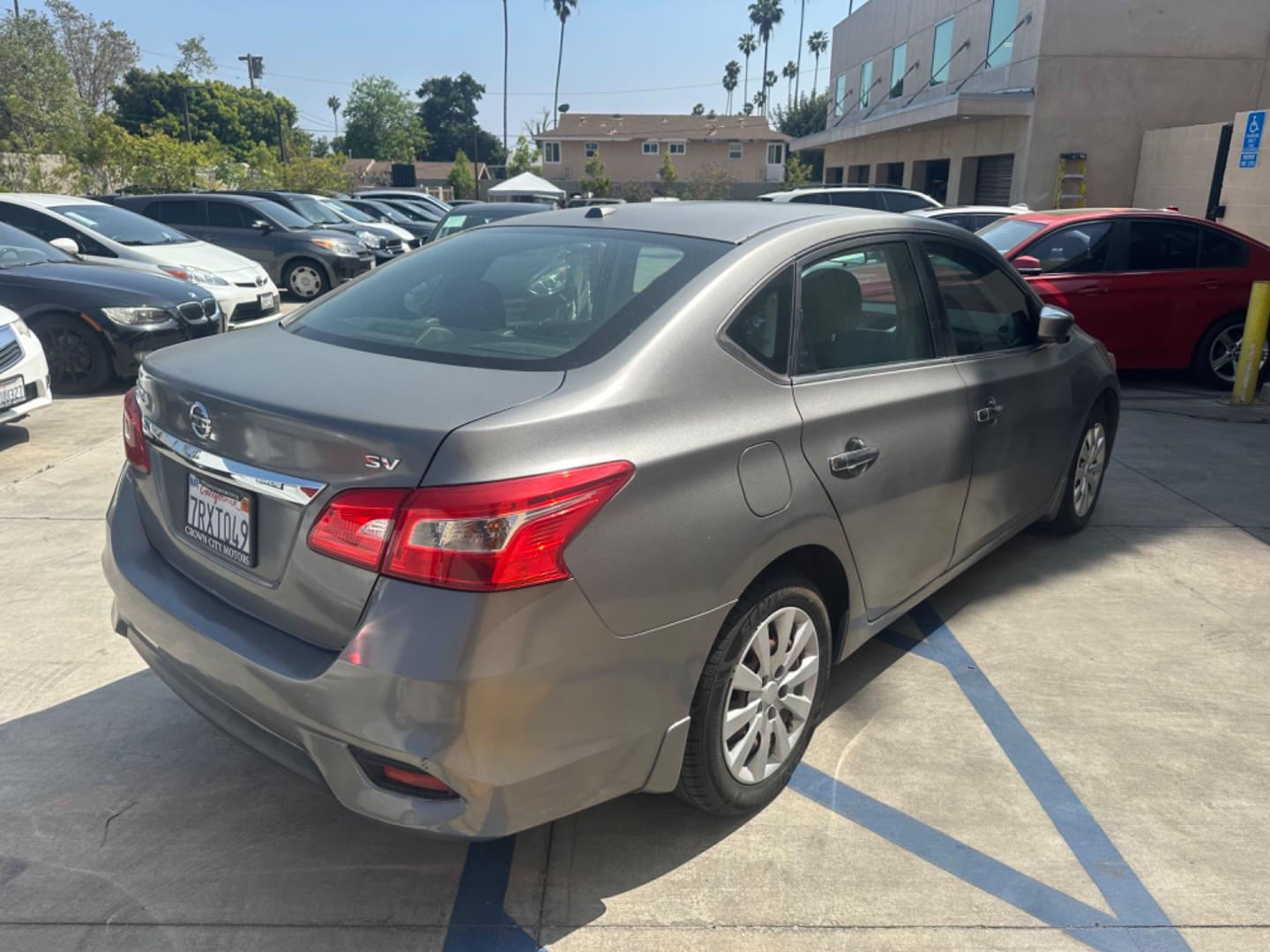 2016 Silver /Black Nissan Sentra FE+ S (3N1AB7AP7GY) with an 1.8L L4 SFI DOHC 16V engine, CVT transmission, located at 30 S. Berkeley Avenue, Pasadena, CA, 91107, (626) 248-7567, 34.145447, -118.109398 - Photo#3